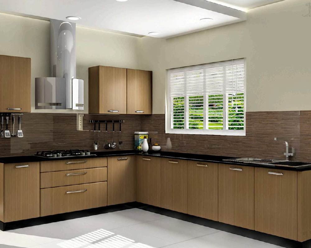 Modular kitchen with grey cabinets and white countertop.